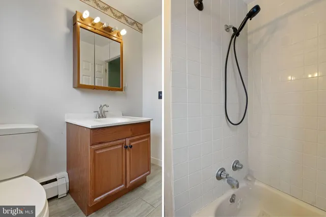 a bedroom with windows