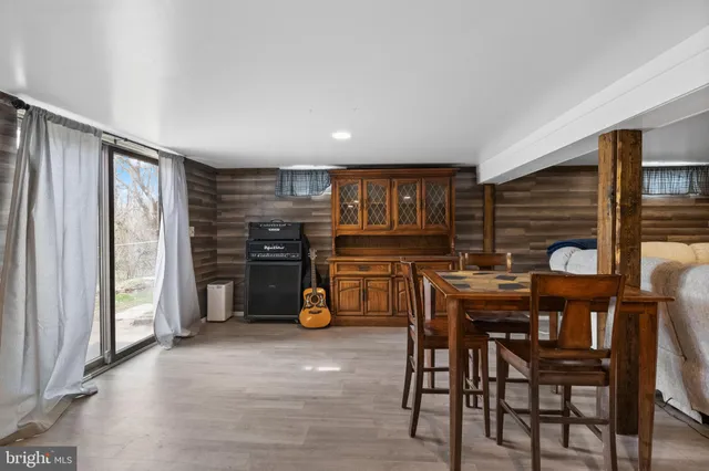 a table and chairs in front of a house