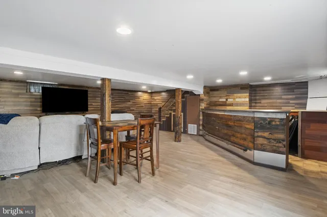 a view of a porch with a wooden fence