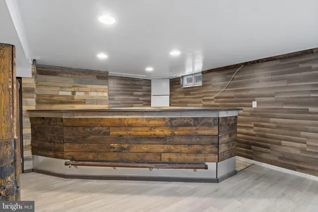 a view of a backyard with large trees