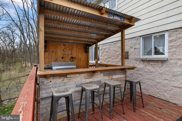an aerial view of residential house with outdoor space
