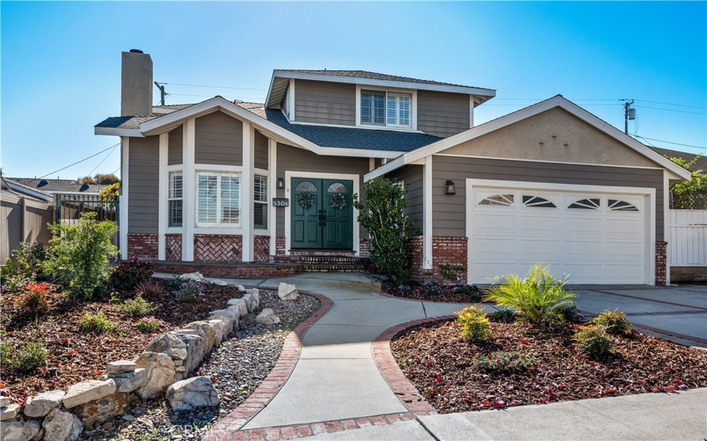 5306 Halison Street Torrance, CA 90503 - Photo 1 of 38 a front view of a house with garden