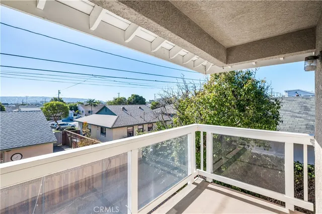 a view of balcony with furniture