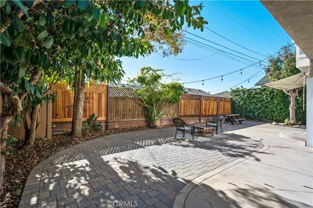 a bench is sitting in middle of a yard