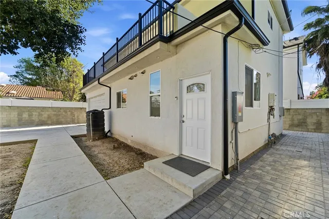 a view of terrace with microwave and door