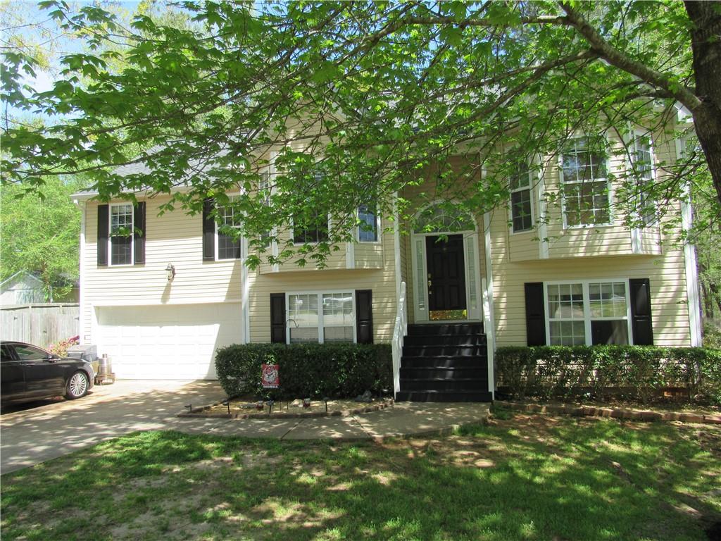 138 Javay Court Villa Rica, GA 30180 - Photo 1 of 1 a front view of a house with a yard
