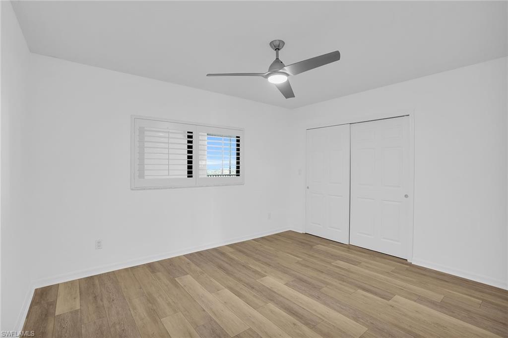 1925 Clifford Street, Unit 1102 Fort Myers, FL 33901 - Photo 27 of 50 a view of empty room with wooden floor