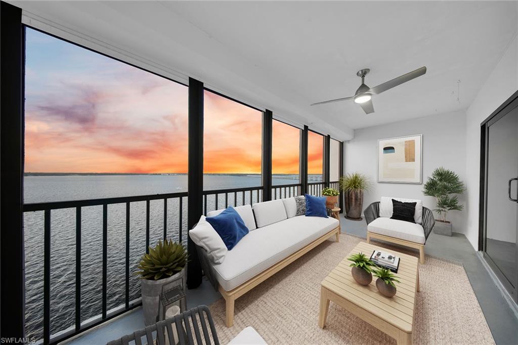 1925 Clifford Street, Unit 1102 Fort Myers, FL 33901 - Photo 29 of 50 a living room with furniture and a large window
