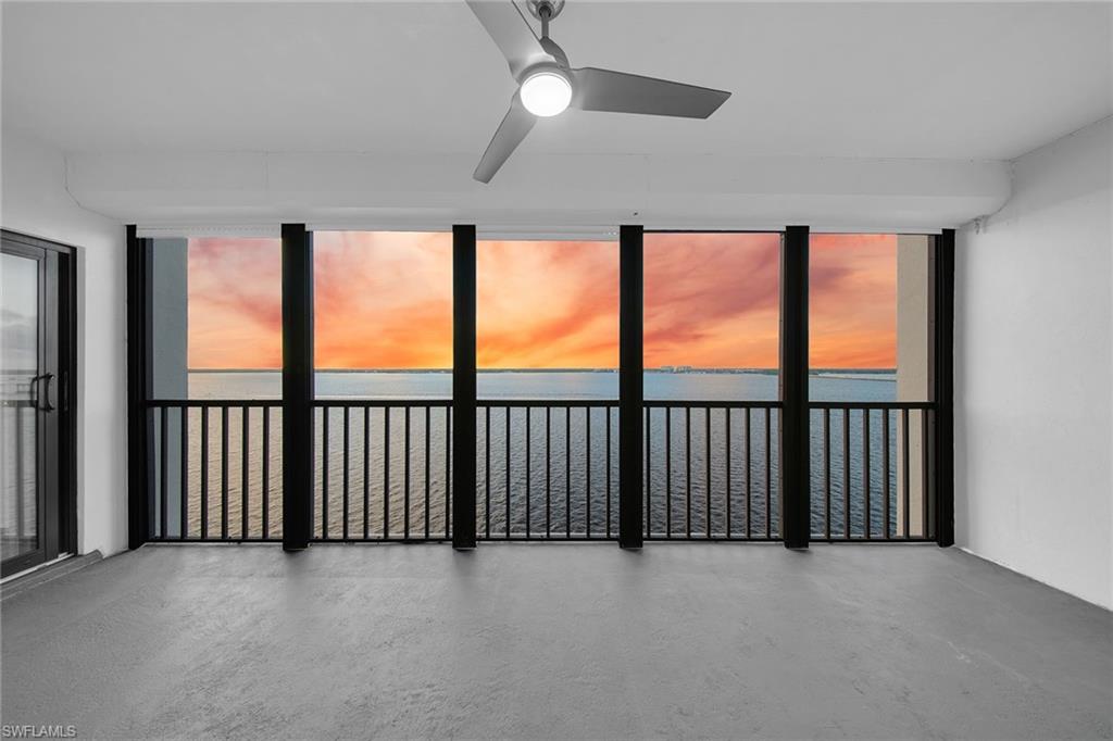 1925 Clifford Street, Unit 1102 Fort Myers, FL 33901 - Photo 32 of 50 wooden floor in an empty room with a window