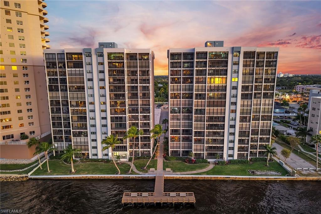 1925 Clifford Street, Unit 1102 Fort Myers, FL 33901 - Photo 35 of 50 a view of a building with a yard
