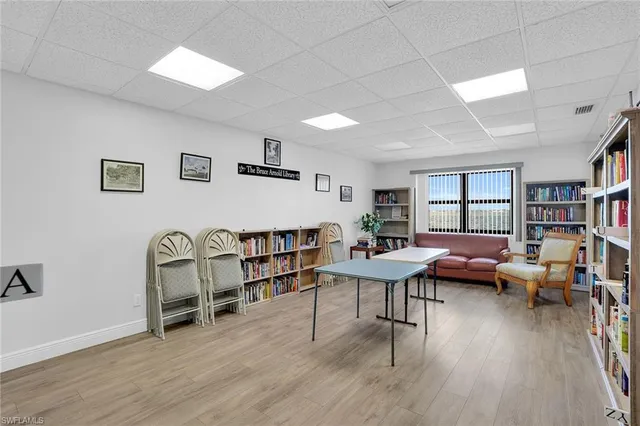 a view of a balcony with chairs