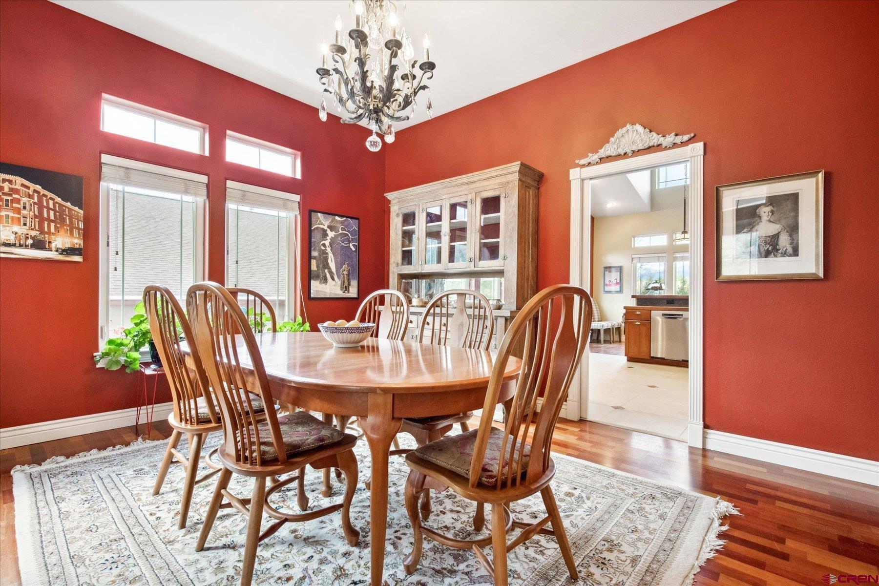39 Ophir Drive Durango, CO 81301 - Photo 15 of 44 a view of a dining room with furniture wooden floor and chandelier
