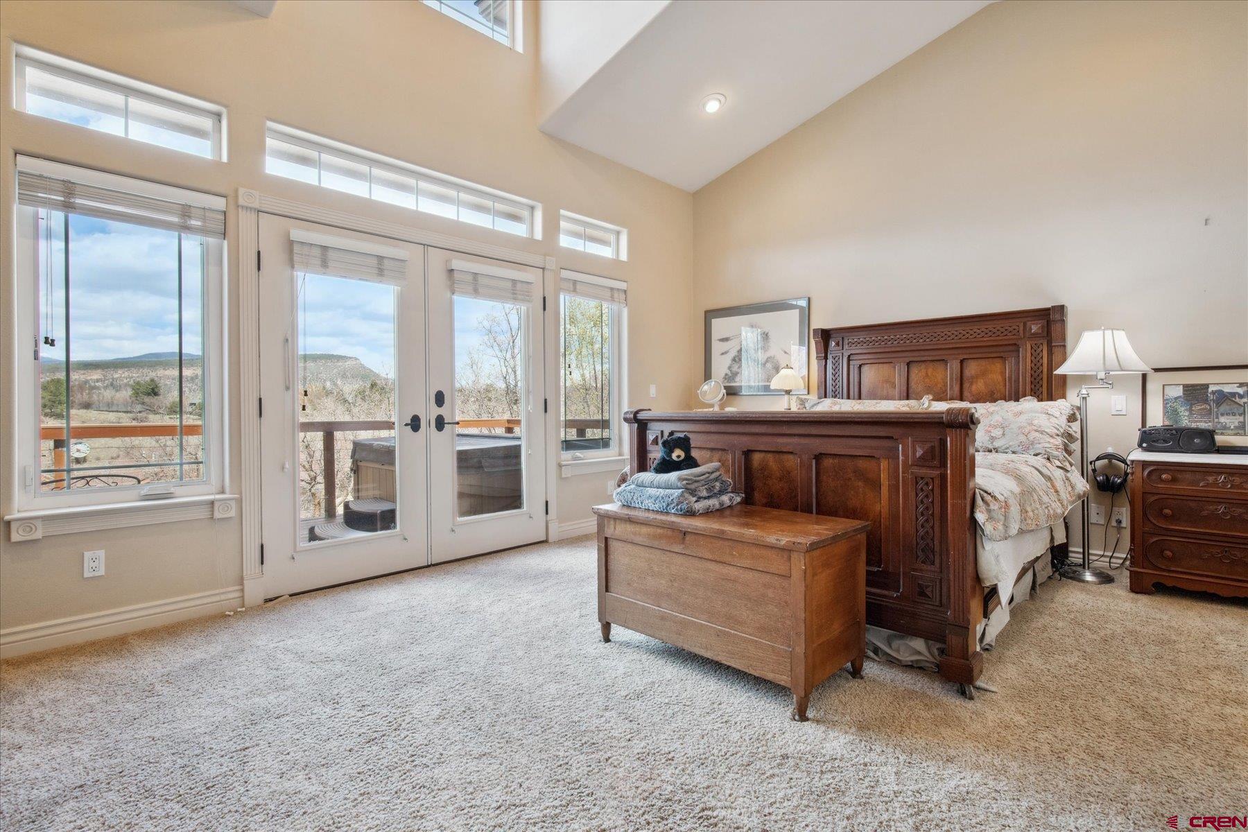 39 Ophir Drive Durango, CO 81301 - Photo 16 of 44 a bed room with a bed and a large window