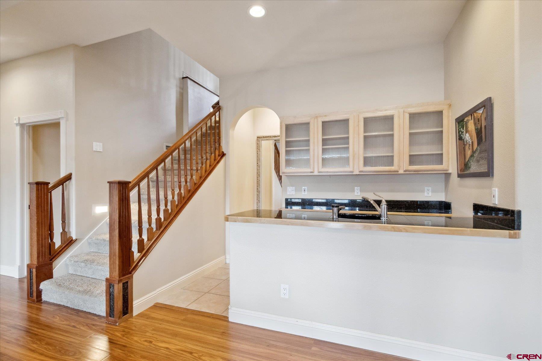 39 Ophir Drive Durango, CO 81301 - Photo 21 of 44 a very nice looking kitchen with wooden floor and a sink
