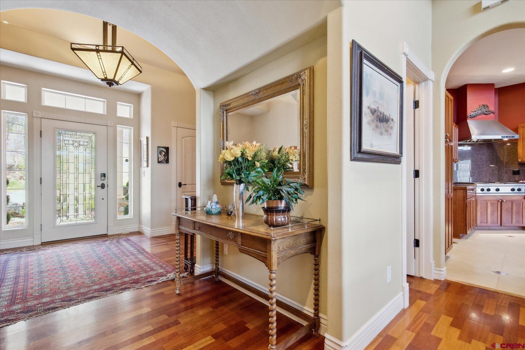39 Ophir Drive Durango, CO 81301 - Photo 3 of 44 a living room with furniture and a potted plant