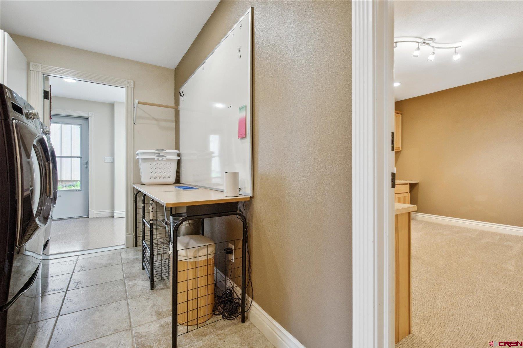 39 Ophir Drive Durango, CO 81301 - Photo 35 of 44 a view of kitchen with furniture and refrigerator