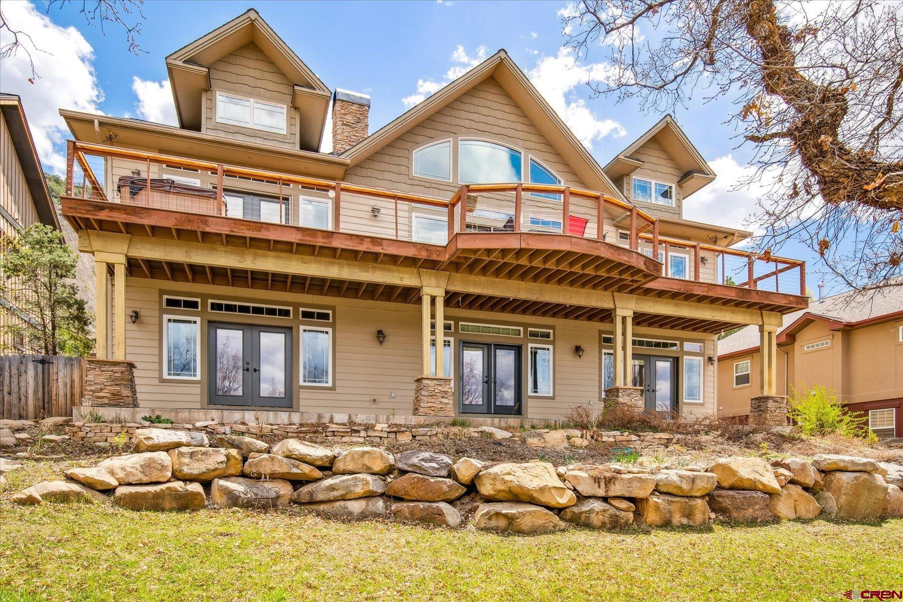 39 Ophir Drive Durango, CO 81301 - Photo 40 of 44 front view of a building with a umbrellas