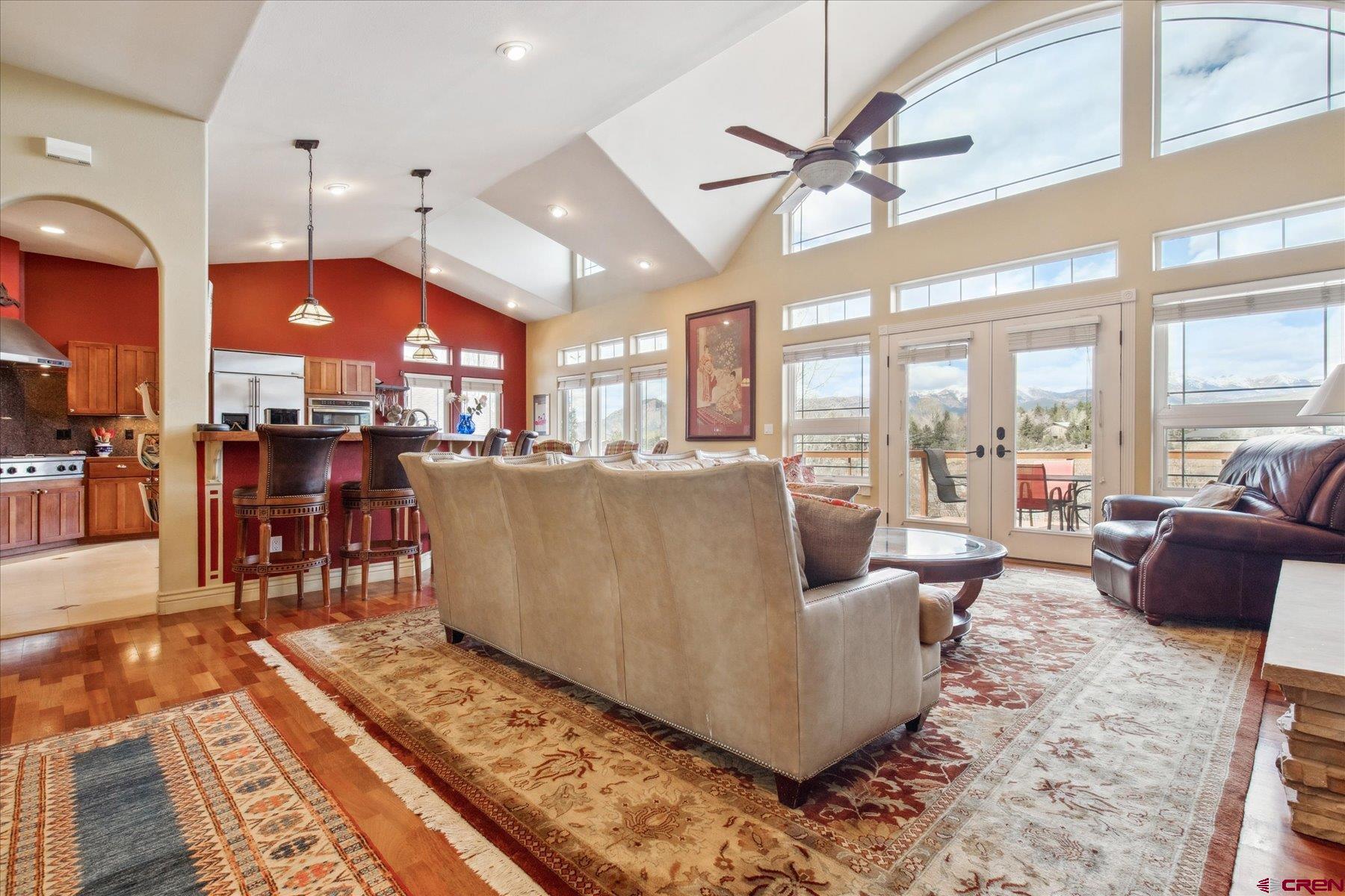 39 Ophir Drive Durango, CO 81301 - Photo 8 of 44 a living room with furniture kitchen area and a large window
