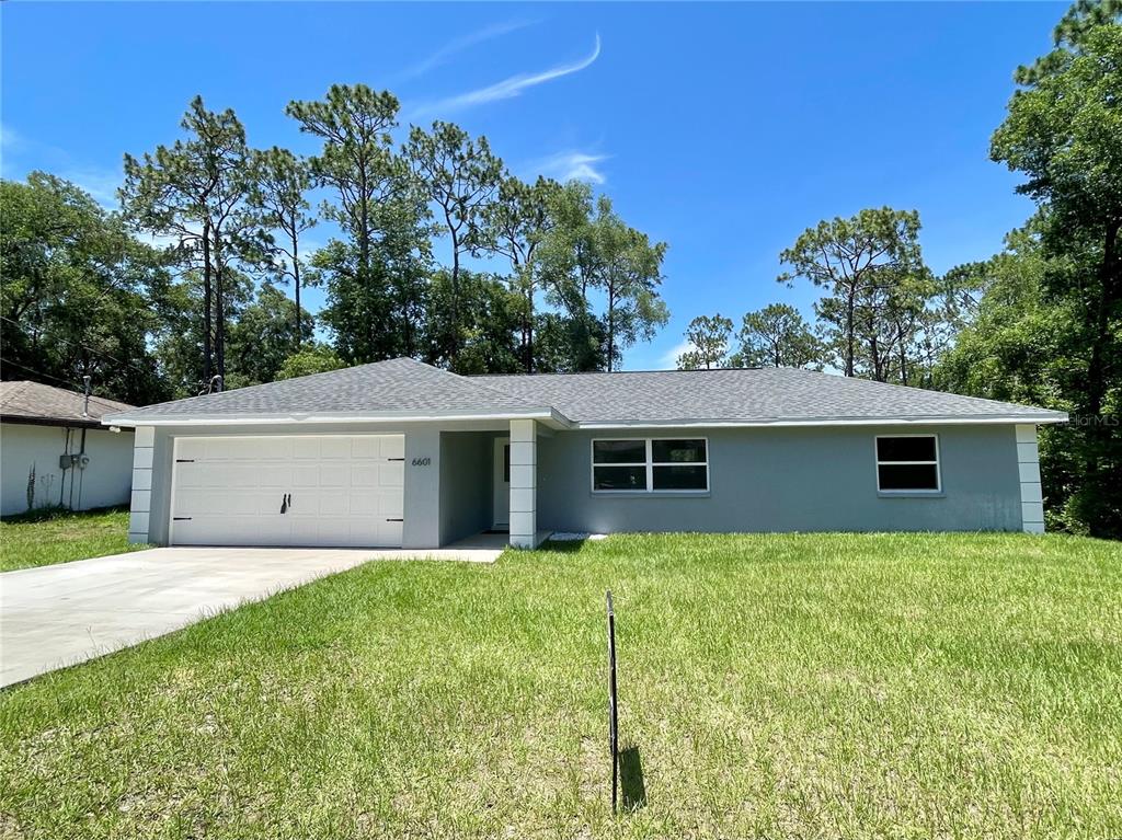 a house with trees in front of it