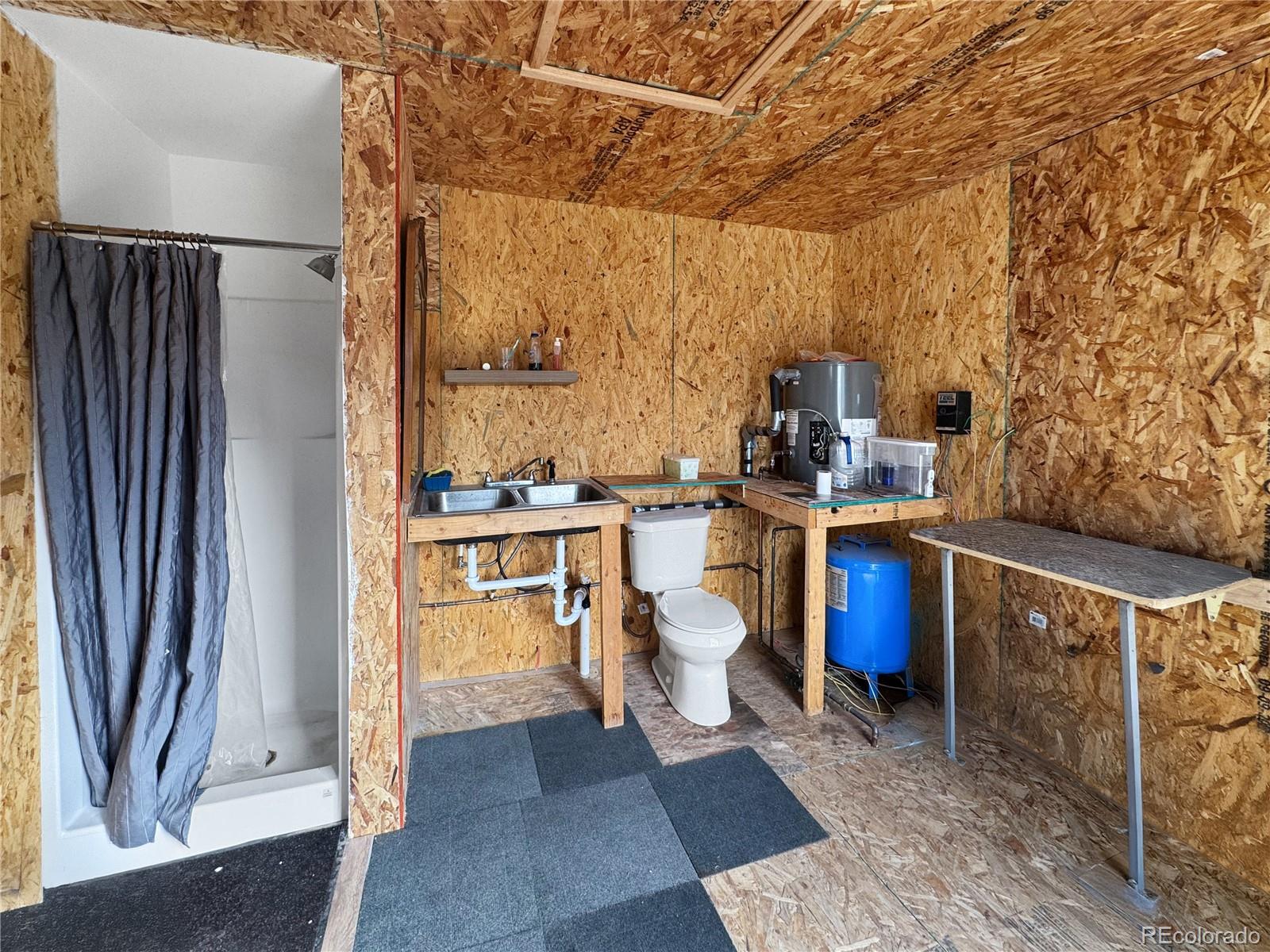 1525 L Path Cotopaxi, CO 81223 - Photo 16 of 28 a kitchen with stainless steel appliances a refrigerator and cabinets