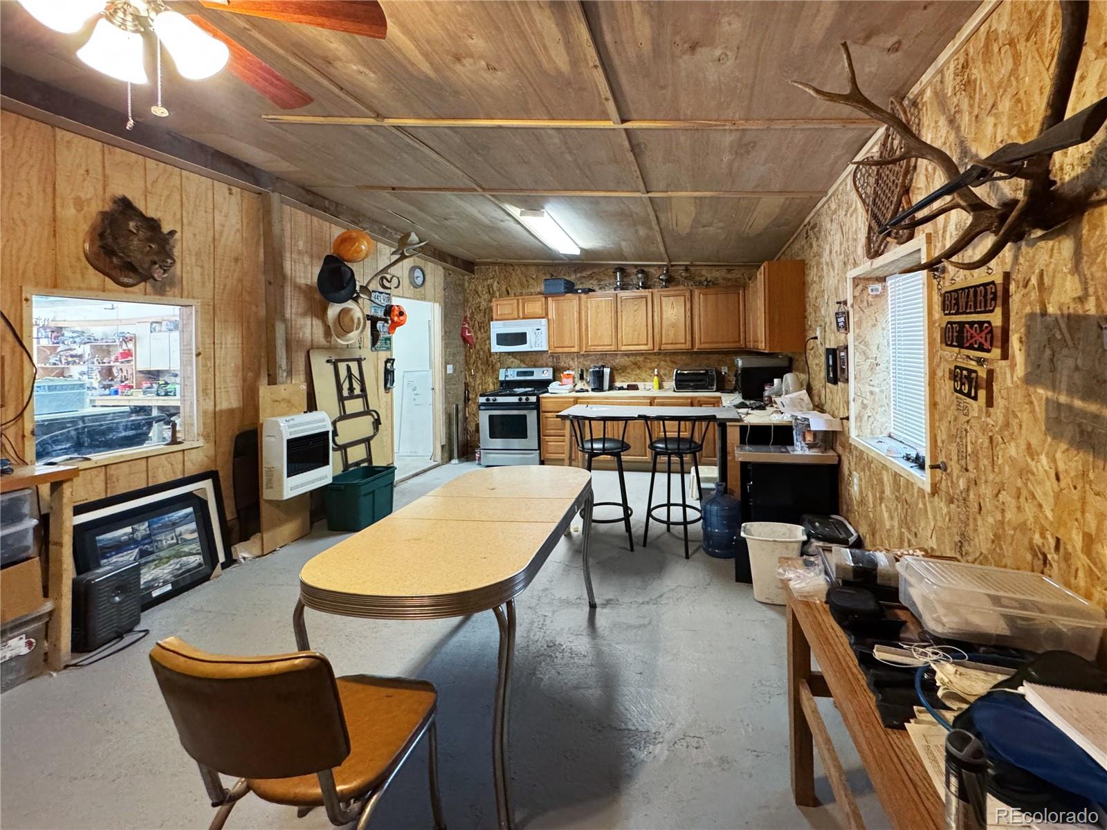 1525 L Path Cotopaxi, CO 81223 - Photo 23 of 28 a view of a dining room with furniture window and wooden floor