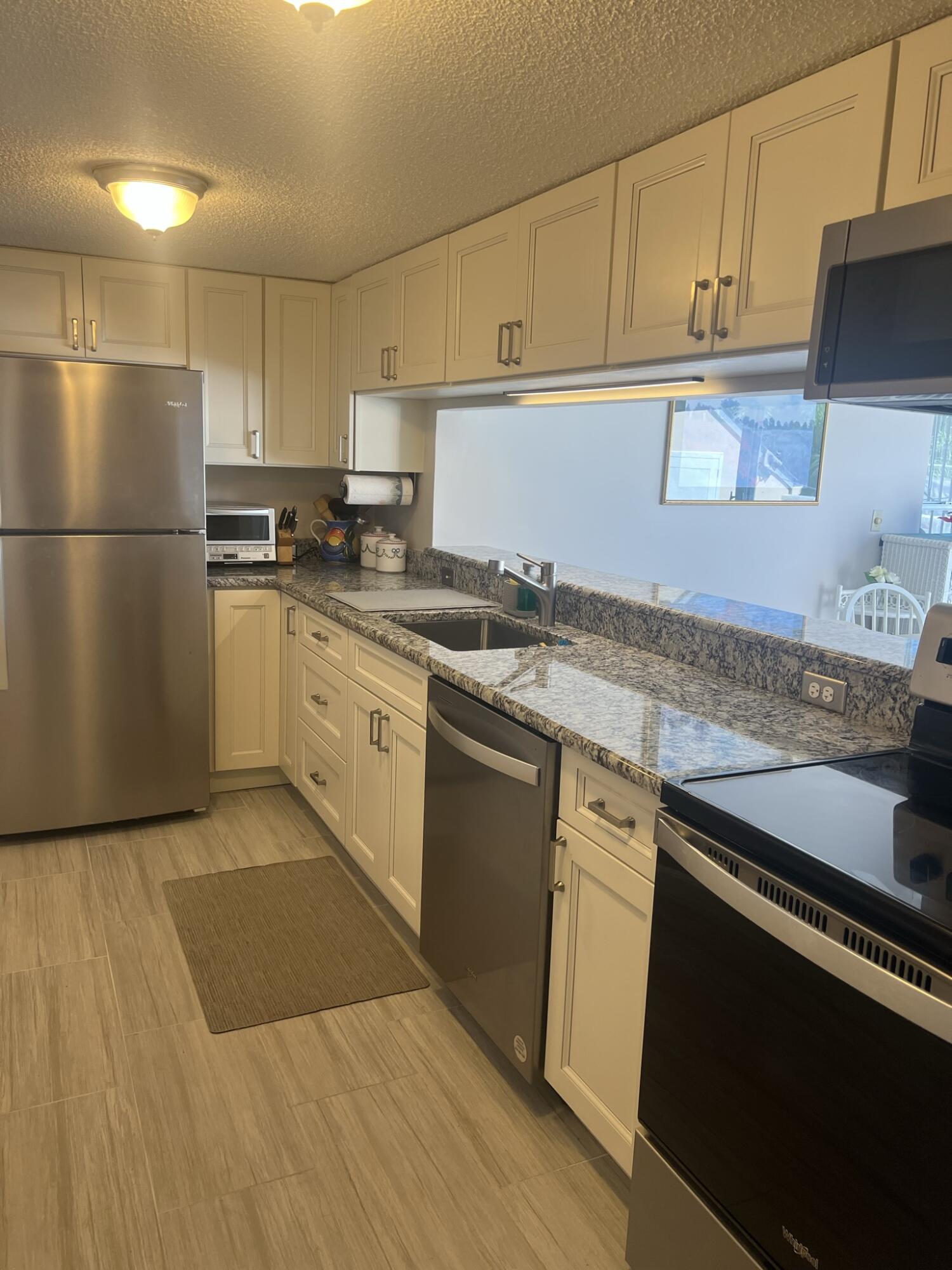 1605 Highway 1, Unit 201M2 Jupiter, FL 33477 - Photo 11 of 47 IMG_3086