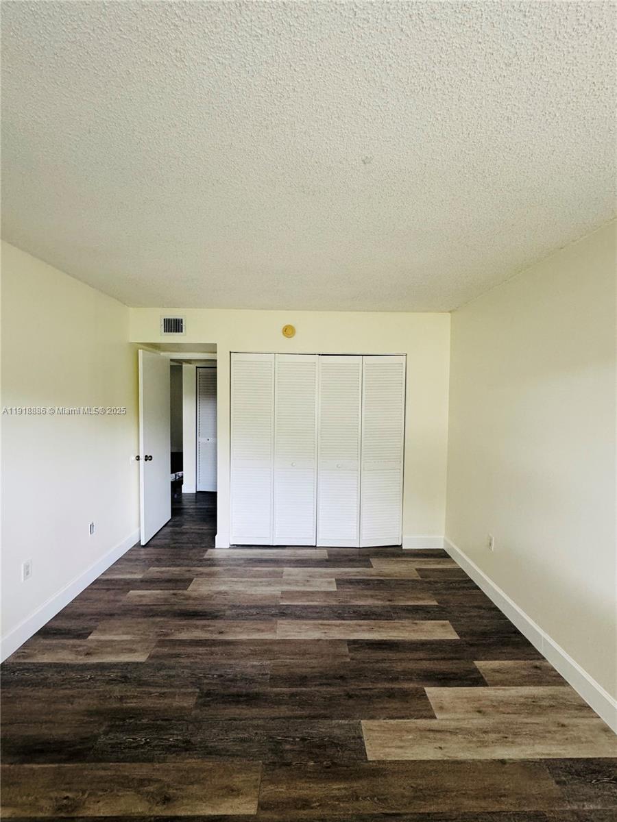 701 North Pine Island Road, Unit 101 Plantation, FL 33324 - Photo 11 of 31 a view of wooden floor