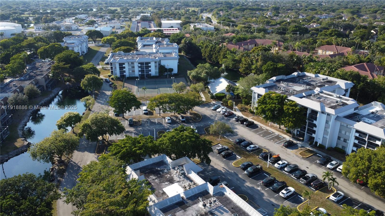 701 North Pine Island Road, Unit 101 Plantation, FL 33324 - Photo 28 of 31 an aerial view of residential houses with outdoor space