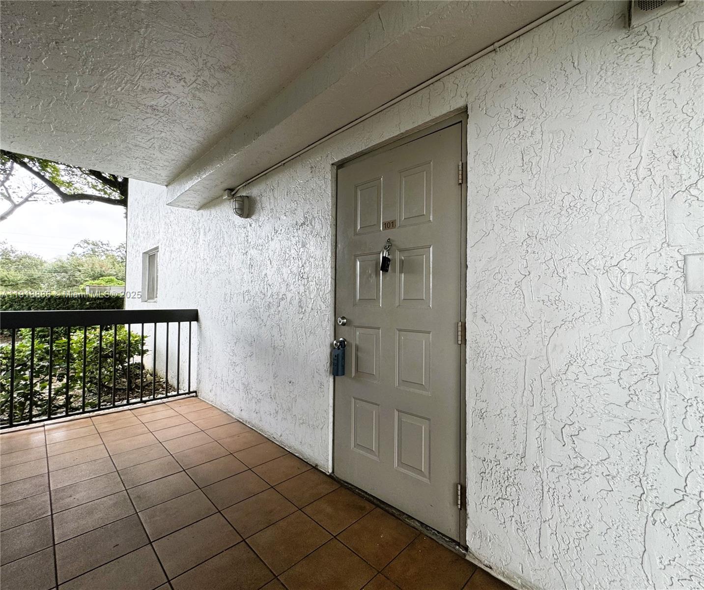701 North Pine Island Road, Unit 101 Plantation, FL 33324 - Photo 3 of 31 a view of front door