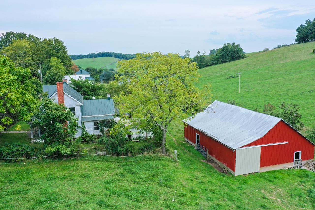 950 McKinley Road Middlebrook, VA 24459 - Photo 2 of 8 a aerial view of a house with table and chairs and a yard