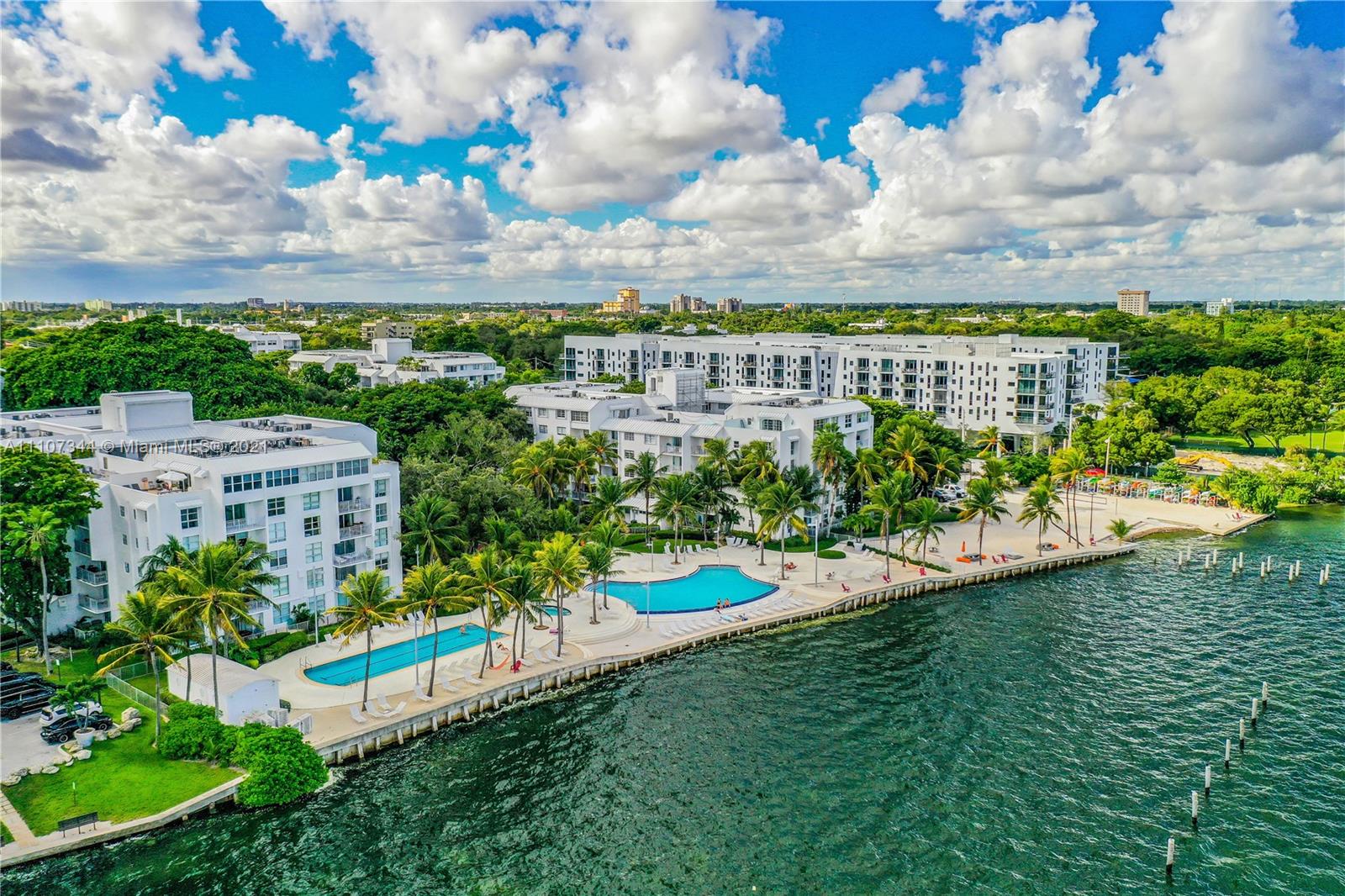 750 Northeast 64th Street, Unit B415 Miami, FL 33138 - Photo 1 of 32 a view of a garden with an ocean