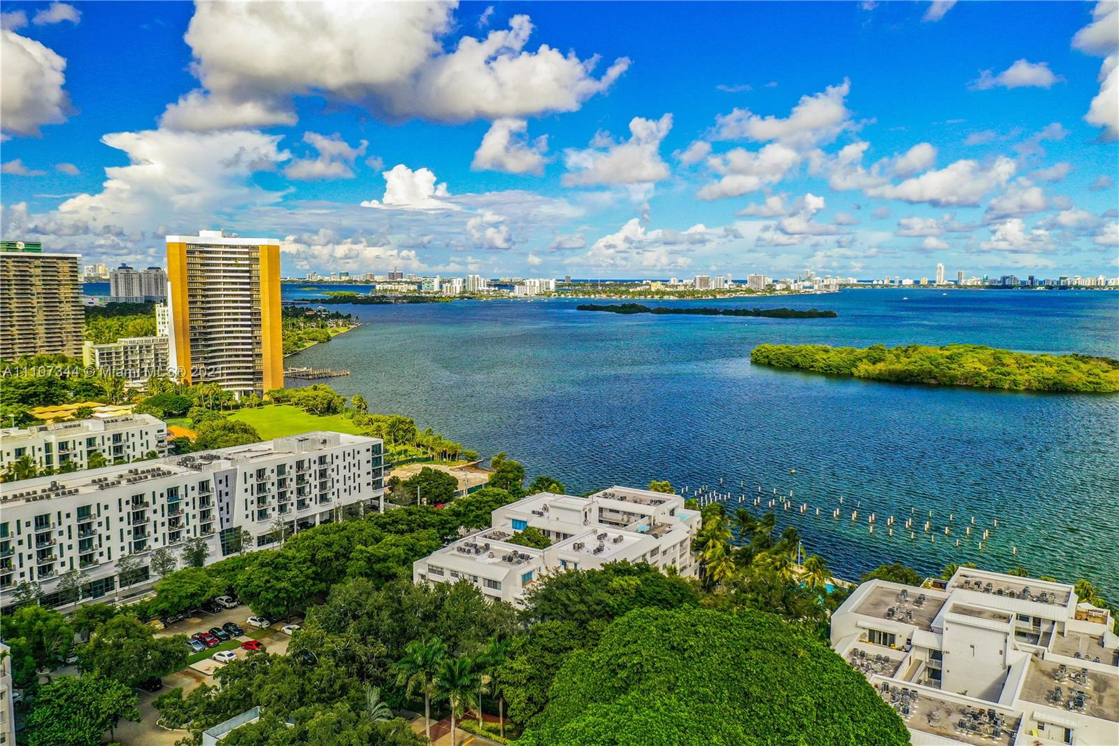 750 Northeast 64th Street, Unit B415 Miami, FL 33138 - Photo 27 of 32 a view of a lake with a city