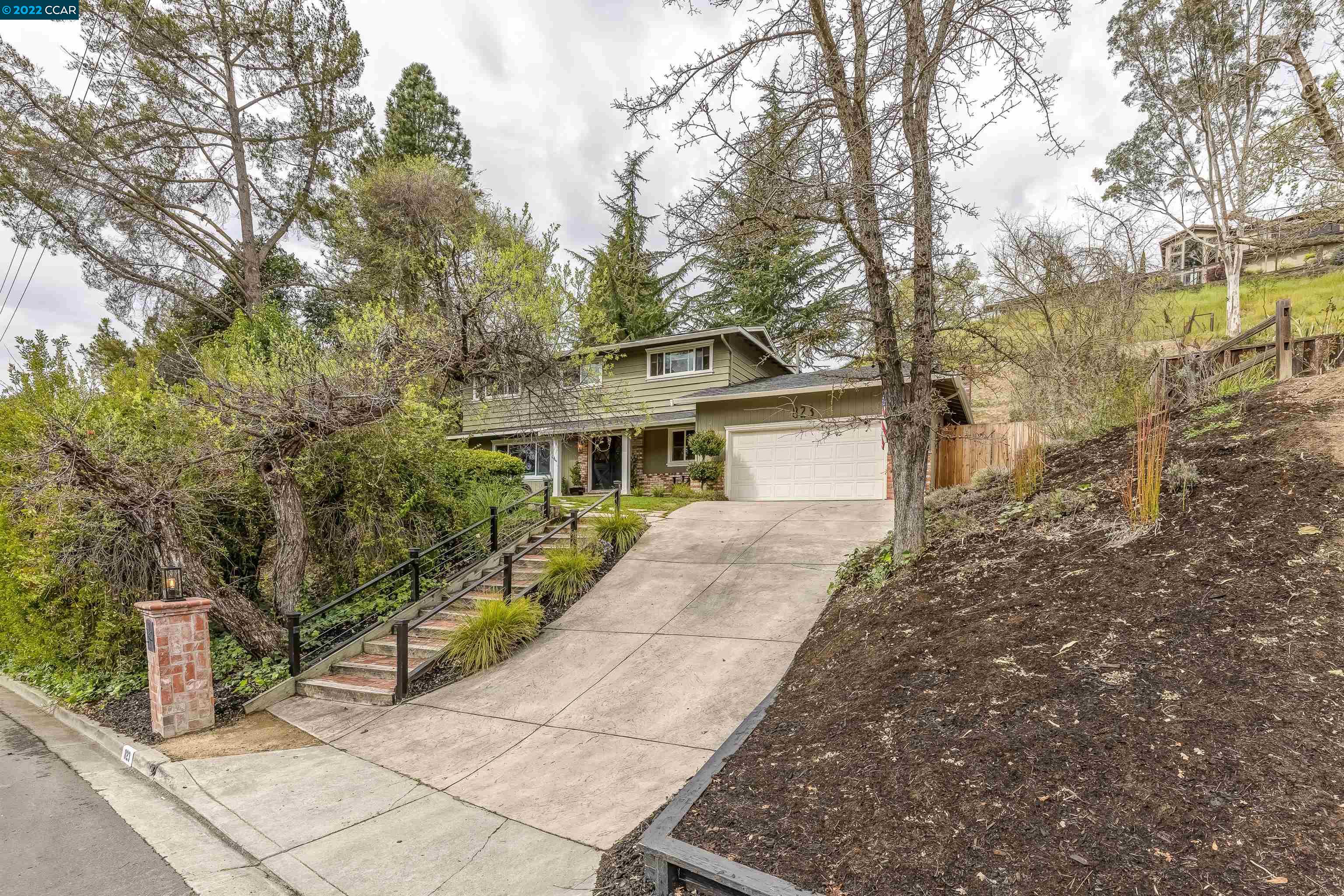 823 El Cerro Boulevard Danville, CA 94526 - Photo 1 of 1 a front view of a house with a garden