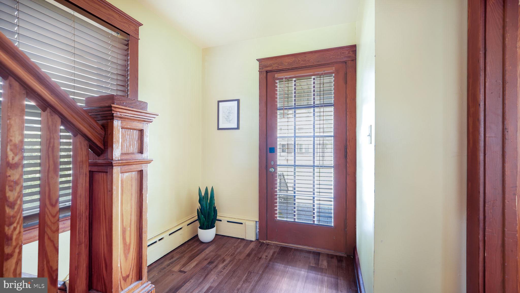148 South Main Street Dublin, PA 18917 - Photo 11 of 21 a view of a room that has a window and wooden floor