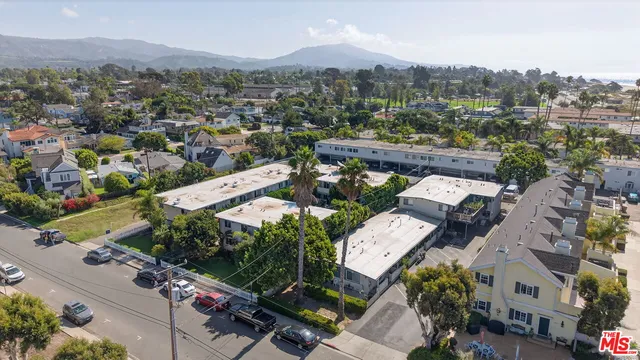 an aerial view of a city with lots of residential buildings