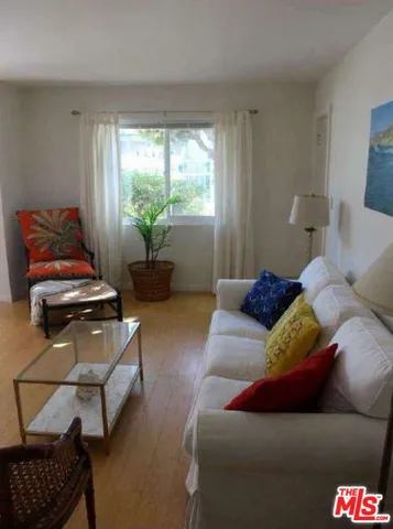 a room with a table and chairs