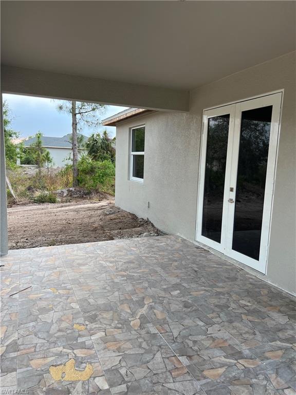 335 Ranch Avenue Lehigh Acres, FL 33974 - Photo 20 of 24 a view of a backyard of a house