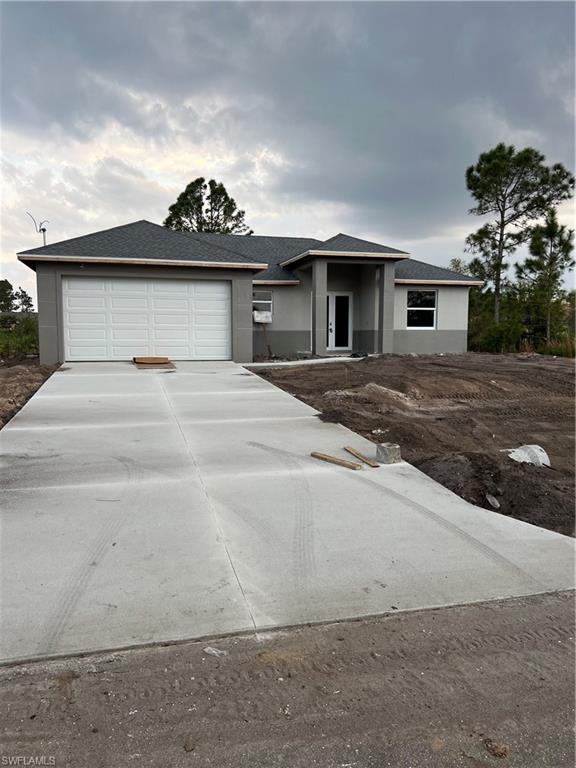 335 Ranch Avenue Lehigh Acres, FL 33974 - Photo 2 of 24 a bathroom with a sink and a mirror