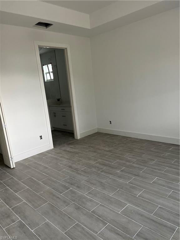 335 Ranch Avenue Lehigh Acres, FL 33974 - Photo 6 of 24 a view of an empty room