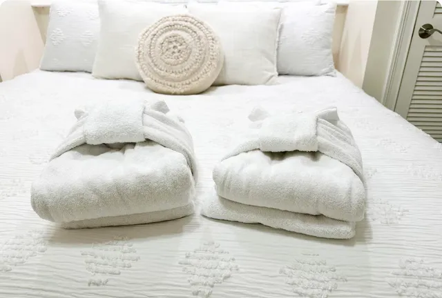 a living room with furniture and flat screen tv