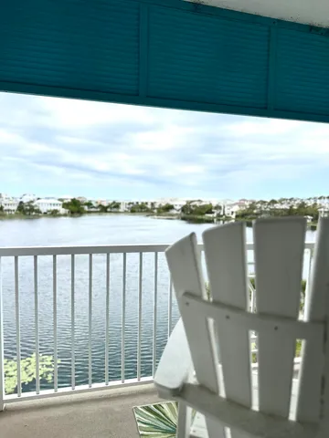 a view of balcony with furniture