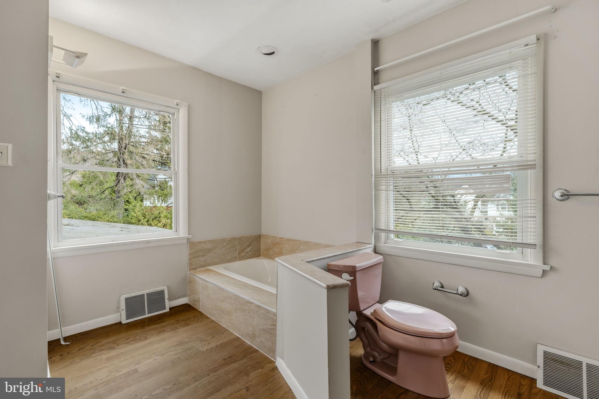 2301 Edgewood Road Harrisburg, PA 17104 - Photo 24 of 63 a bathroom with a sink toilet and window