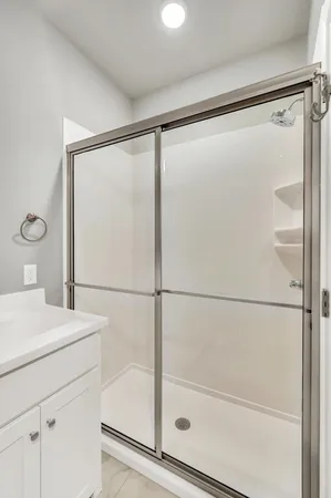 an empty room with a bathroom