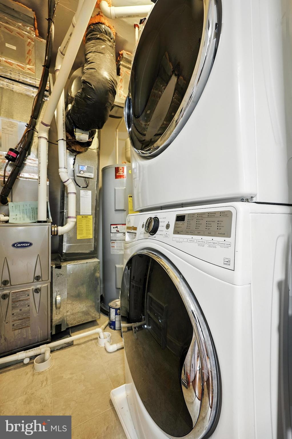 3910 Doc Berlin Drive, Unit 21 Silver Spring, MD 20906 - Photo 17 of 27 a utility room with dryer and washer