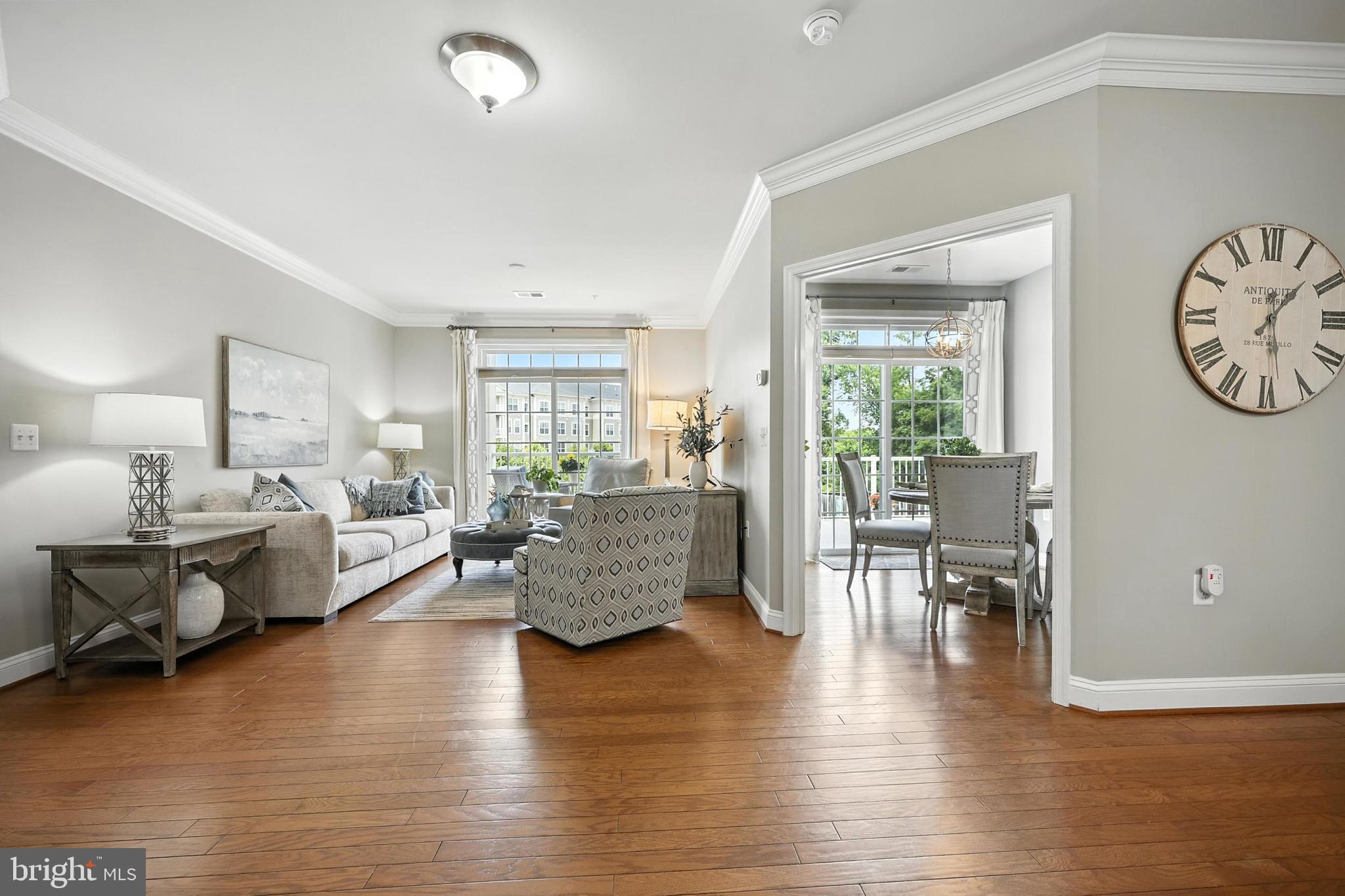 3910 Doc Berlin Drive, Unit 21 Silver Spring, MD 20906 - Photo 8 of 27 a living room with furniture and a large window