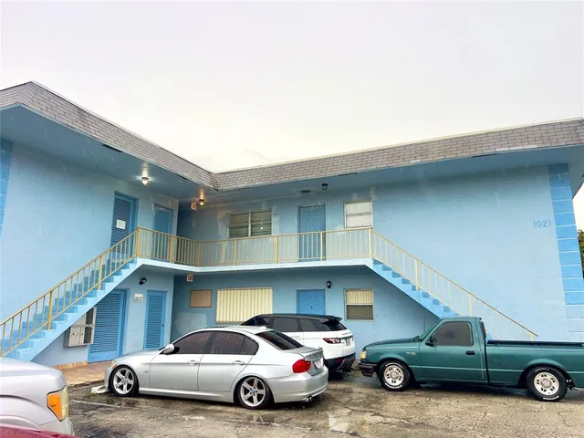a car parked in front of a house