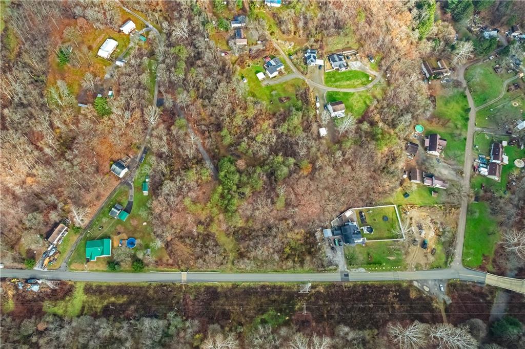 405 Jacoby Road Cheswick, PA 15024 - Photo 9 of 11 a view of a yard with plants and trees