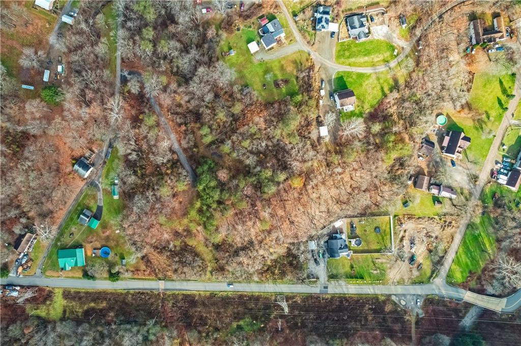 405 Jacoby Road Cheswick, PA 15024 - Photo 10 of 11 a backyard of a house with a yard and outdoor seating