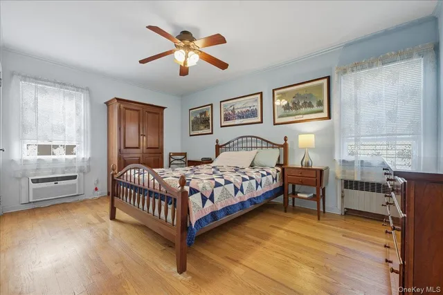 a bedroom with a bed and a table in it