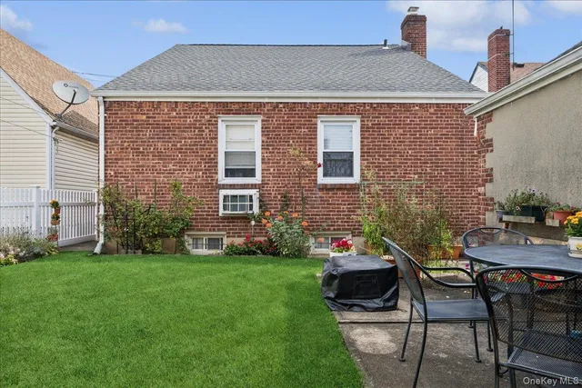 a brick house with a backyard